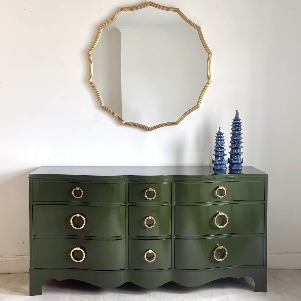 green vintage dresser Gideon Verde Shagreen painted intricate floral and vine design Five spacious drawers for ample storage Solid wooden construction for durability Brass knobs for a vintage aesthetic Elevated on tapered legs for easy cleaning underneath Uses Dark Green Dresser and Thrifted